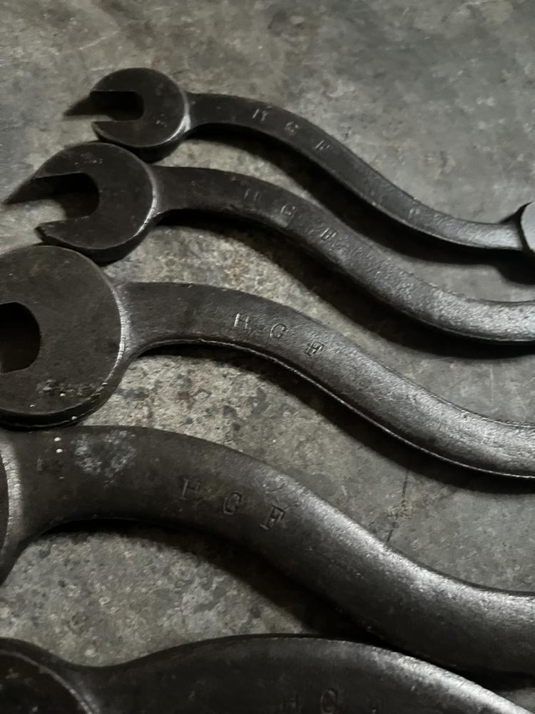 Close-up of the wrench shanks, each stamped H.C.F.