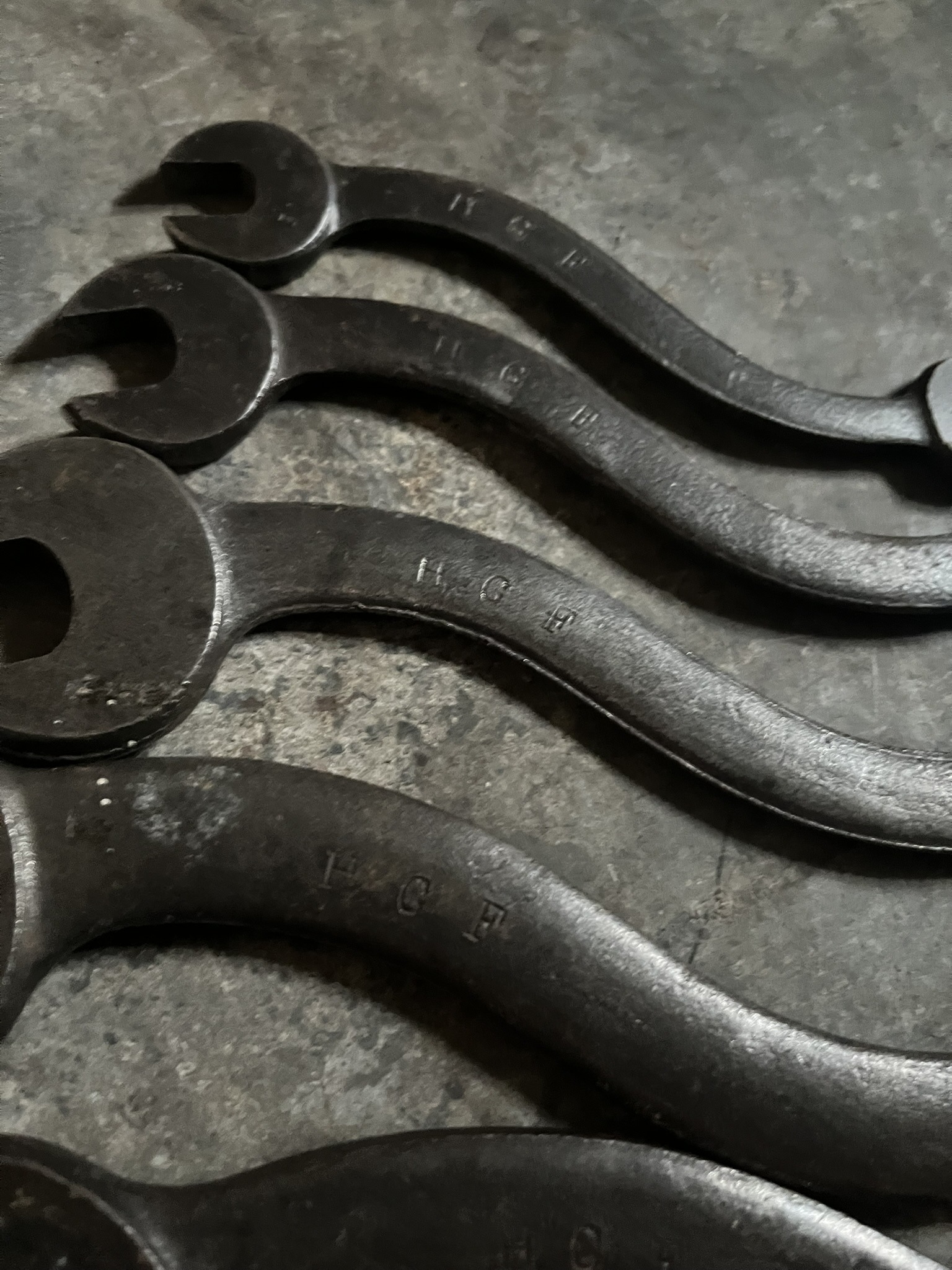 Close-up of the wrench shanks, each stamped H.C.F.