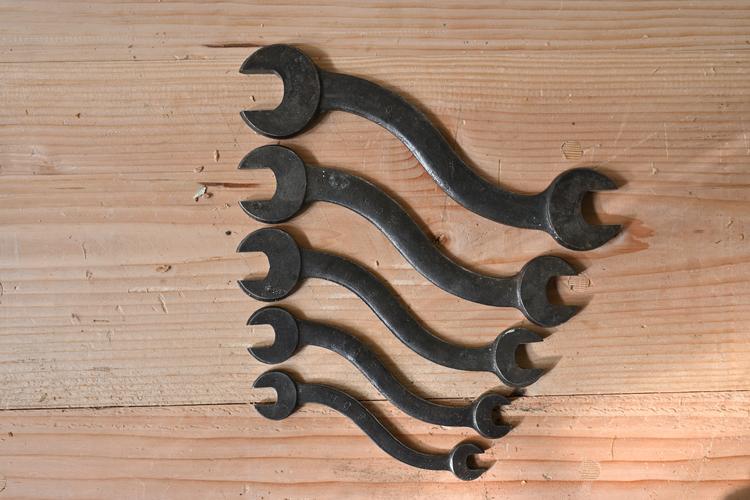 Snake-shaped wrenches without maker marks from the Fackelman chest. All are stamped HCF.